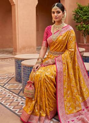 indian yellow heavy zari weaving work banarasi silk blend saree 4