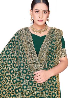 Designer rama heavy zari embroidery work georgette saree 4