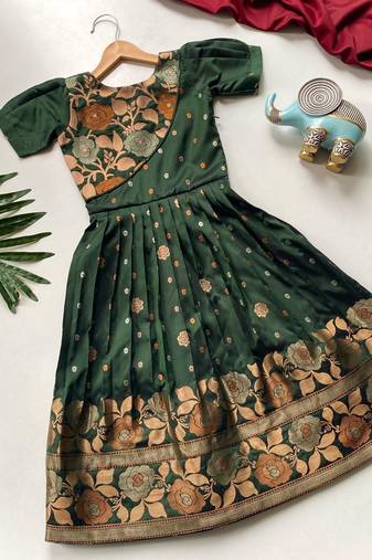 Charming girls frock with intricate floral weaving and a stylish panel design