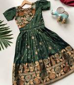 Charming girls frock with intricate floral weaving and a stylish panel design