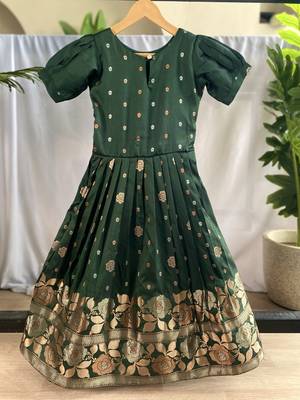 Charming girls frock with intricate floral weaving and a stylish panel design 2