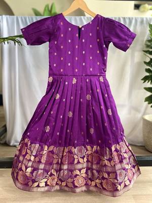 Charming girls frock with intricate floral weaving and a stylish panel design 2