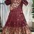 Charming girls frock with intricate floral weaving and a stylish panel design