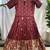 Charming girls frock with intricate floral weaving and a stylish panel design