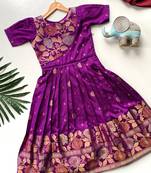 Charming girls frock with intricate floral weaving and a stylish panel design
