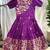 Charming girls frock with intricate floral weaving and a stylish panel design