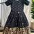 Charming girls frock with intricate floral weaving and a stylish panel design