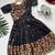 Charming girls frock with intricate floral weaving and a stylish panel design
