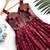 Charming girls frock with intricate floral weaving and a stylish panel design