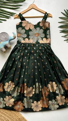 Charming girls frock with intricate floral weaving and a stylish panel design 1