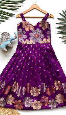 Charming girls frock with intricate floral weaving and a stylish panel design 1