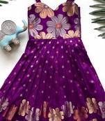 Charming girls frock with intricate floral weaving and a stylish panel design