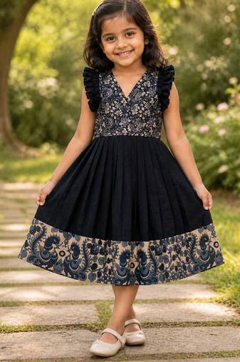 Girls middy dress with  beautifully crafted an elegant printed hem and a stunning printed yoke