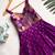 Charming girls frock with intricate floral weaving and a stylish panel design