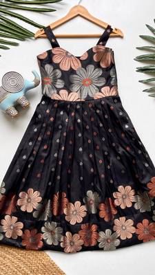 Charming girls frock with intricate floral weaving and a stylish panel design 1