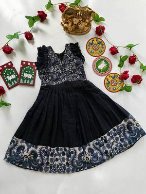 Girls middy dress with  beautifully crafted an elegant printed hem and a stunning printed yoke 4