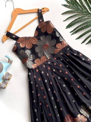 Charming girls frock with intricate floral weaving and a stylish panel design 2
