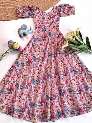 Light pink floral flare dress with puff sleeves and a round neckline 1