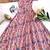 Light pink floral flare dress with puff sleeves and a round neckline
