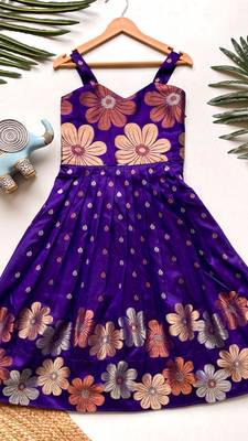 Charming girls frock with intricate floral weaving and a stylish panel design 1