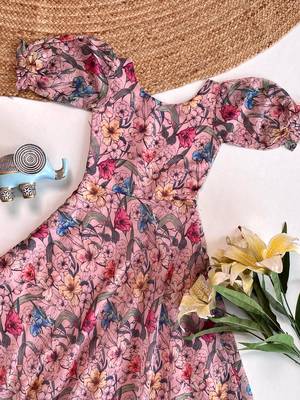 Light pink floral flare dress with puff sleeves and a round neckline 2