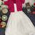 Off-white zari butti gown with a delicate pink butti jacket