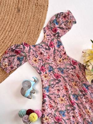 Light pink floral flare dress with puff sleeves and a round neckline 3
