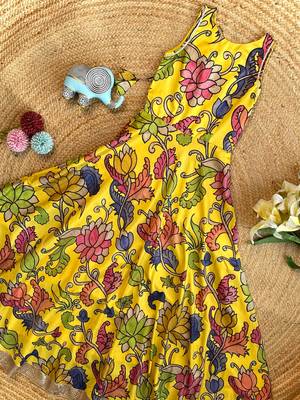 Yellow tussar silk gown for girls features a vibrant pen kalamkari floral print 3