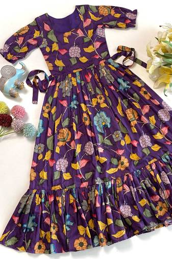 Purple tussar silk gown for girls features a vibrant pen kalamkari floral print