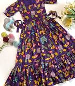 Purple tussar silk gown for girls features a vibrant pen kalamkari floral print