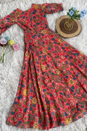 This flared penkalamkari dress with gota detailing and a front tie-up