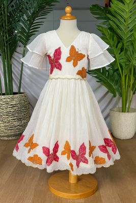 Dreamy girls gown featuring hand-painted butterflies and flared sleeves 1