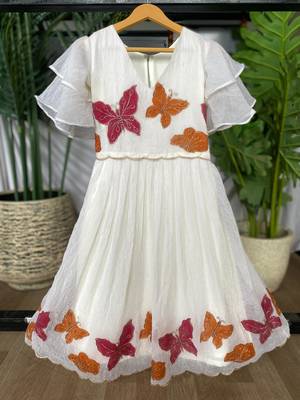 Dreamy girls gown featuring hand-painted butterflies and flared sleeves 2