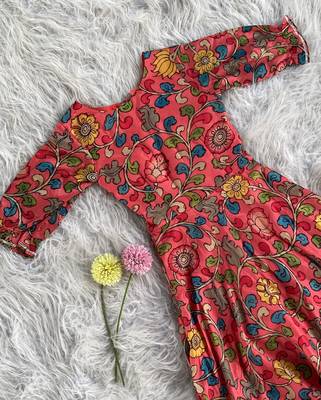 This flared penkalamkari dress with gota detailing and a front tie-up 3