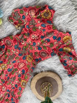 This flared penkalamkari dress with gota detailing and a front tie-up 4