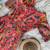 This flared penkalamkari dress with gota detailing and a front tie-up