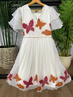 Dreamy girls gown featuring hand-painted butterflies and flared sleeves 4