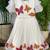 Dreamy girls gown featuring hand-painted butterflies and flared sleeves
