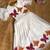 Dreamy girls gown featuring hand-painted butterflies and flared sleeves