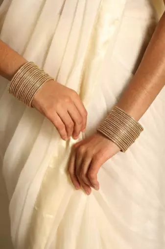 Gold metal bangle set for traditional & festive wear