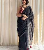 Black hand block printed mulmul cotton saree with blouse piece
