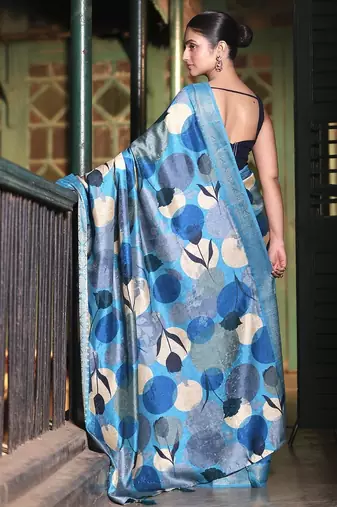 Blue abstract print soft silk saree with zari border with blouse piece