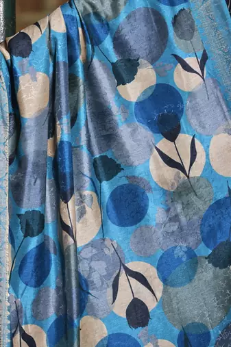 Blue abstract print soft silk saree with zari border with blouse piece