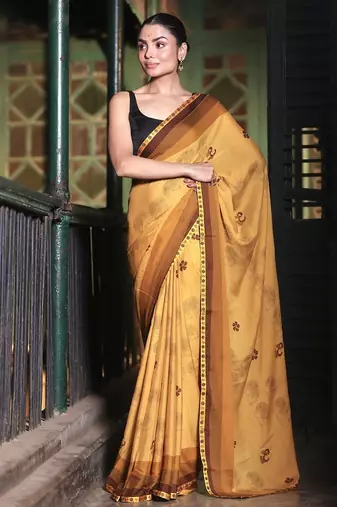 Soft moss crepe mustard printed saree with blouse piece