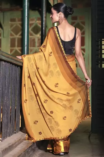 Soft moss crepe mustard printed saree with blouse piece