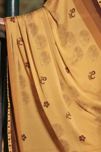 Soft moss crepe mustard printed saree with blouse piece