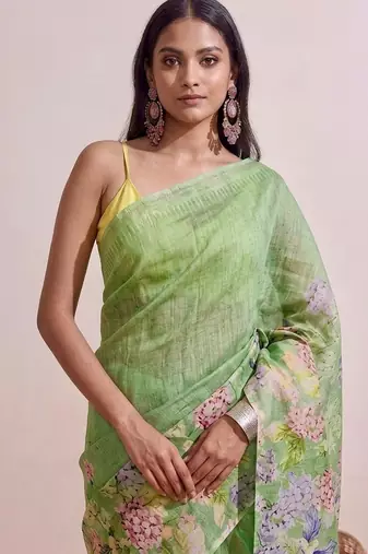 Pastel green floral chanderi silk saree with blouse piece