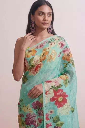 Cyan floral chanderi silk saree with blouse piece