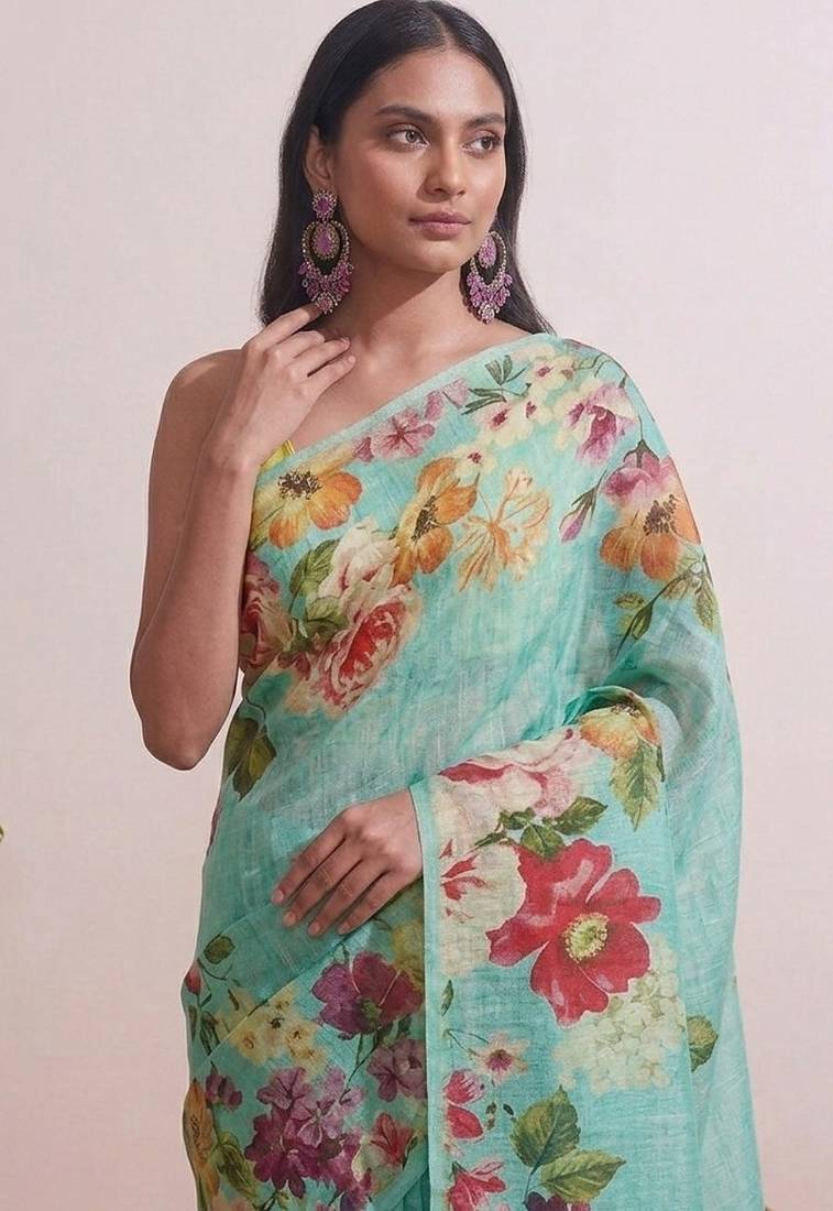 Cyan floral chanderi silk saree with blouse piece