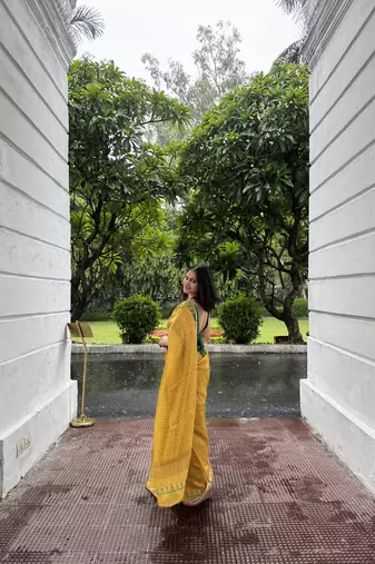 Yellow checked linen blend saree with blouse piece